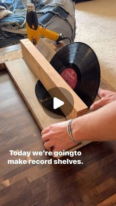 NICK DANSIE on Instagram: "Record wall shelves! Available for purchase in store or on eBay from @recordshackut ‼️ search for “record shelves made from old vinyl records” on eBay   #vinyl #records" Vinyl Record Side Table, Things To Make With Vinyl Records, Vinyl Shelves Diy, 45 Records Decorating With, Vinyl Record Shelves Diy, How To Display Vinyl Records On Wall, Guitar Wall Display Ideas, What To Do With Old Vinyl Records, Vinyl Record Upcycle