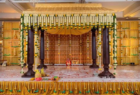 Traditional & Classy south Indian Wedding Mandap Decor with flowers and bells.. Decor @wedbyd.events Follow www.decorsutrablog.com for Ideas about Indian Wedding Decor Email your original pictures to @decorsutrablog@gmail.com to get featured. #wedmegood #weddingsutra #shaadisaga #shaadimagic #weddingz #WeddingInspiration #decoration #weddinginspo #instawedding #weddingflowers #haldiceremony #weddingreception #traditionalwedding #engagementdecor #weddingdetails #indianweddings #shaadi #dreamw Marriage Hall Decoration, Hindu Wedding Decorations, Indian Wedding Stage, Engagement Stage Decoration, Mandap Design, Reception Stage Decor, Simple Stage Decorations, Wedding Stage Backdrop, Wedding Hall Decorations