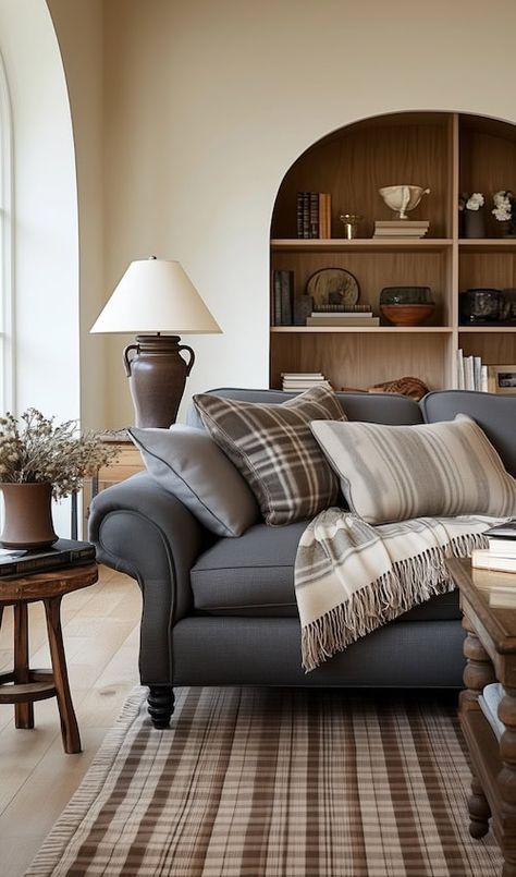 How To Style A Living Room Around A Grey Couch Gray Brown And White Living Room, Farmhouse Living Room With Gray Couch, Styling Brown Couch, Plaid Couch Living Room, Taupe Couch Living Room, Light Grey Leather Couch, Transitional Living Room Ideas, Taupe Couch, Gray Sofa Living Room