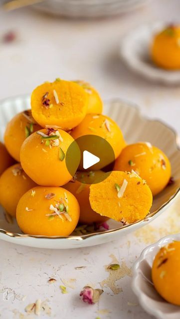 Hayley Dhanecha on Instagram: "Get the mango coconut badam ladoo recipe! Comment “ladoo” and you’ll receive a clickable recipe link in your DMs! Follow @jcookingodyssey for more Indian sweets recipes. 

These mango coconut ladoos have the addition of ground almonds, making them a luxurious treat. 

They’re beautifully soft and melt in the mouth. 

Recipe at https://www.jcookingodyssey.com/mango-badam-coconut-ladoo-season-of/

#mangoladoo #coconutladoo #indiansweets #ladoo #indiandessert" Indian Sweets Recipes, Coconut Ladoo Recipe, Coconut Ladoo, Ladoo Recipe, Recipes Snacks, Indian Dessert, Quick Recipes Snacks, Coconut Almond, Mango Coconut