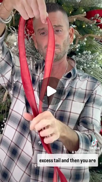 Jesse Cooper on Instagram: "SINGLE BOW - This is for all my beginners. Anybody who doesn’t have a bunch of experience using ribbon or know what to do with ribbon. This is one of the easiest ways to add ribbon into your tree. I’m using a 2 inch wired ribbon. And creating just a simple single loop bow that you put all over the tree. Once you master this, of course you can add more. Of course you can do other things. Of course you can dovetail the end of the tails. But I wanted to create a very simple basic technique video that anyone can do! Make sure to share with all of your friends so they can have awesome ribbon in their tree for Christmas 2024. 🎅🏻✨❤️🎄🎄🎄🎄 #BringingTheSimpleRibbonTechniques #MakingSureEveryoneHasABeautifulChristmas #SimpleBow #SingleBow" Simple Ribbon On Christmas Tree, Wired Ribbon Christmas Tree, How To Make A Bow With Ribbon For Tree, Simple Bows For Christmas Trees, Making A Bow For Christmas Tree, Easiest Way To Make A Bow, How To Add Ribbon To Your Christmas Tree Video, How To Add Bows To Christmas Tree, Hanging A Wreath With Ribbon