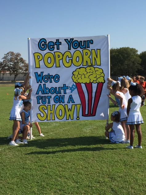 Cheer run thru sign - Get your popcorn, we're about to put on a show!! Football Run Thru Signs, Cheer Signs For Football Games, Cheer Competition Signs Posters, Runthrough Signs Football, Cheer Run Through Signs Football, Playoff Football Signs, Cheer Signs For Football, Cheer Run Through Signs, Run Through Signs Football