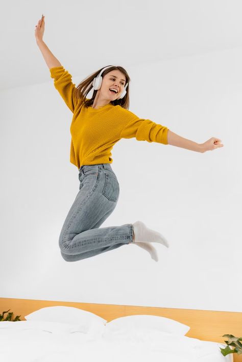 Woman Jumping, Jumping Poses, Wearing Headphone, Student Photo, Listening Music, Advertisement Design, Pose Inspiration, Inspirational Photos, Shot Photo