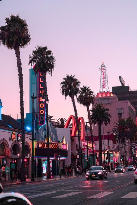 An evening photo of Los Angeles' Hollywood Boulevard Beautiful Los Angeles, Hollywood Boulevard Aesthetic, Los Angeles Manifestation, Los Angeles Night Life, West Hollywood Aesthetic, Los Angeles Vibes Aesthetic, Downtown Los Angeles Aesthetic, Los Angeles Night Aesthetic, Los Angeles Aesthetic Night