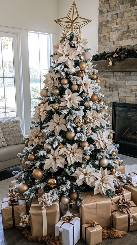 Frosted Christmas tree with poinsettias and metallic ornaments, surrounded by gifts and a cozy fireplace in natural light. Beige Mom Christmas, Boho Farmhouse Christmas Tree, Frosted Tree Decorations, Christmas Tree Poinsettia Decorations, Frosted Christmas Tree Decorations, Frosted Christmas Tree Ideas, Brown Christmas Tree Decorations, Beige Christmas Tree, Farmhouse Christmas Tree Ideas