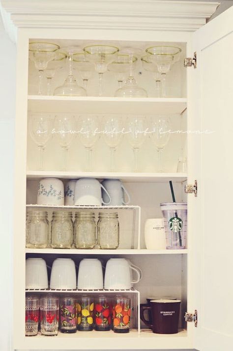 Storage isn't exactly a luxury if you're living in a small space. It's the one thing homeowners always seem to need more of. So, we've rounded up these brilliant storage ideas, specifically for small kitchens. Whether you're running out of space on your counter tops, need space for your appliances or your kitchen cabinets are way in over their heads storing food, these ideas will help you get your kitchen organization back on track. Small Kitchen Organization, Small Kitchen Storage, Kitchen Organization Diy, New Kitchen Cabinets, Kitchen Cabinet Organization, Trendy Kitchen, Cabinet Organization, Diy Kitchen, Organization Hacks