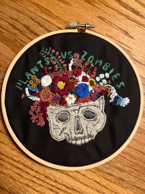 Made using a pattern from Stitchcraft by Gayla Partridge. Hand embroidery | plants vs zombies | embroidered flowers | skull embroidery Embroidery Plants, Skull Embroidery, Plants Vs Zombies, Partridge, A Pattern, Embroidered Flowers, Zombie, Hand Embroidery, Embroidery