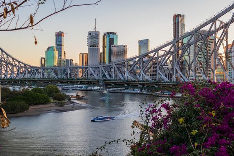 The Story Bridge is a heritage-listed steel cantilever bridge spanning the Brisbane River that carries vehicular, bicycle and pedestrian traffic between the northern and the southern suburbs of Brisbane, Queensland, Australia. It is the longest cantilever bridge in Australia.  The bridge connects Fortitude Valley to Kangaroo Point. The Story Bridge opened in 1940 and was tolled until 1947. It is named after prominent public servant John Douglas Story. Cantilever Bridge, Public Servant, John Douglas, Brisbane River, City Scapes, Fortitude Valley, Brisbane Queensland, Property Investment, Brisbane Australia