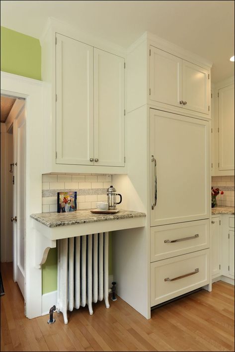 Want to hide an old radiator? Surround it with beautiful cabinets. #kitchen #radiator #customdesign #cabinets #whitecabinets #craftsmen Kitchen Counter Over Radiator, Cabinet Over Radiator, Kitchen Radiator Cover, Kitchen Cabinets Over Radiator, Radiator Kitchen Ideas, How To Hide Radiator In Kitchen, Kitchen With Radiator, Radiator In Kitchen, Kitchen Radiator Ideas