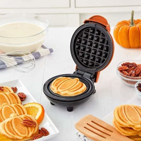 A waffle-maker machine to make yummy mini pumpkin-shaped waffles. This gadget also makes hash browns and paninis! Basically, it's already made plans for you: Fall brunch party. Your place. Be there. 26 Inexpensive Products That'll Help Make Your Fall So Much Better Pumpkin Spice Waffles, Pasteles Halloween, Pumpkin Mold, Mini Waffle Maker, Biscuit Pizza, Waffle Irons, Pumpkin Waffles, Potato Bites, Waffles Maker