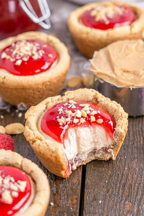 Peanut Butter And Jelly Cups, Peanut Butter And Jelly Cookie Cups, Caramel Peanut Butter Cookie Cups, Peanut Butter And Jelly Desserts, Cookie Cup Recipes, Mini Cookie Cups, Jelly Thumbprint Cookies, Peanut Butter Cookie Cups, Peanut Butter And Jelly Cookies