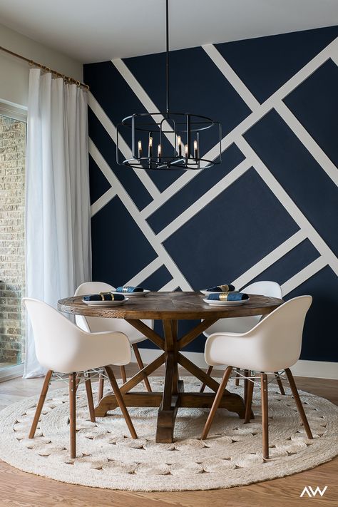 blue accent wall with white rectangles in a kitchen nook Wall Linings Ideas, Kitchen Wall Painting Design, Blue Tape Wall Design, Wall Paint Lines Design, Crazy Accent Wall, Line Wall Painting, Black Wall Paint Design, Blue Tape Designs Accent Walls, Painting Lines On Walls Ideas