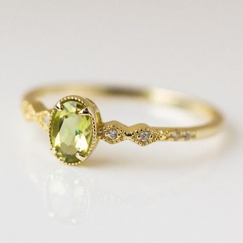 Calling all peridot lovers! The Luxe Ring from Melinda Maria features bright green peridot on a dainty band set with sparkling CZs for a little bit of extra glam. Simulated peridot Cubic zirconia 18k yellow gold vermeil plated Sterling silver base Turquoise Wedding Ring Set, Peridot Wedding Band, Mens Wood Rings, Halo Wedding Rings Sets, Pear Engagement Ring Halo, Moonstone Engagement Ring Set, Peridot Engagement Rings, Diamond Engagement Rings Cushion, Oval Halo Engagement Ring