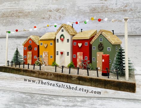 Christmas Scene with working lights! Handcrafted and designed by The SeaSalt Shed Diy Scrap Wood Christmas Village, Wooden Houses Christmas Decoration, Small Wooden House Decor, Christmas Scene Craft, Diy Wood Houses Christmas, Wood Block Houses Christmas, Wood Christmas Houses Diy, Christmas Wooden Houses Craft, Diy Wood Christmas Village