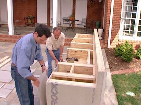 How to Weather-Proof an Outdoor Kitchen Cabinet : How-To : DIY Network Diy Outdoor Kitchen How To Build, How To Build Outdoor Kitchen Cabinets, Outdoor Kitchen Cabinets Diy, How To Build An Outdoor Kitchen, Diy Outdoor Cabinet, Outdoor Cabinets, Outdoor Kitchen Kits, Cabinet Diy, Outdoor Island