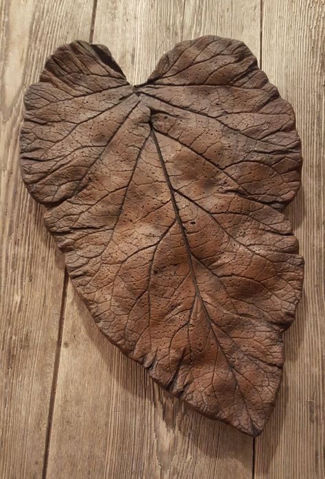 You can make your sand mold smooth or lumpy. concrete leaf casting by marlas Leaf Casting, Concrete Leaves, Monstera Leaf, Moth, Insects, It Cast, Make Your, Make It Yourself