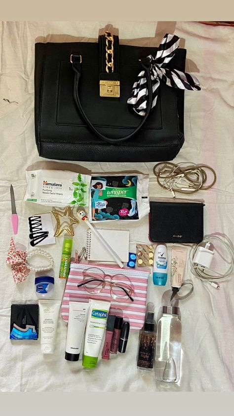 What’s in my Bag: Facial wipes ,Sanitary pads, Nail filer ,Wallet, Earphones ,Scrunchie ,Tic tak clips ,Notepad and pen ,Mouth fresher ,Medicines, Hand sanitizer, Hand cream,Bodymist ,Sunscreen ,Moisturiser ,Lipgloss and lipstick ,Vaseline ,Makeup pouch ,Charger, Chewing gum ,Safety pins, Water bottle, Roll on deodorant ,Claw clip ,Anti glare glasses Vaseline Makeup, Notepad And Pen, Roll On Deodorant, Anti Glare Glasses, Essential Pouch, Padded Pouch, Inside My Bag, Facial Wipes, Handbag Essentials