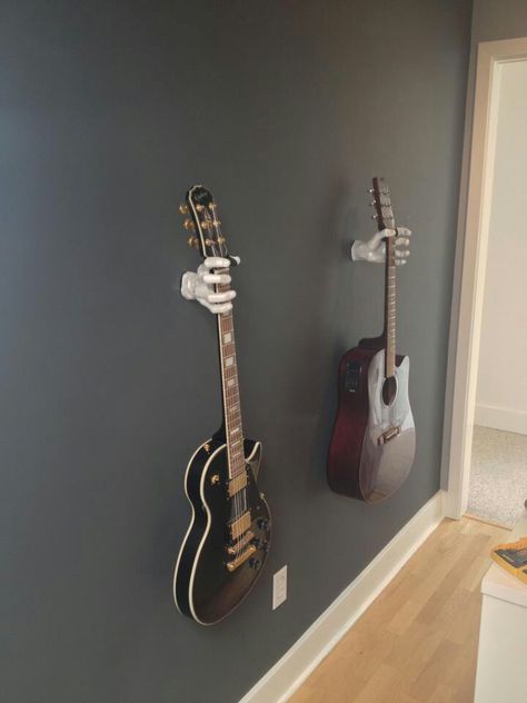 Guitar holders; something like this would be fantastic to hold all 8 guitars.. 3d Tiskárna, Bedroom Ideas For Men, Music Bedroom, Guitar Wall Hanger, Home Music Rooms, Guitar Room, Music Studio Room, Guitar Hanger, Music Room Decor