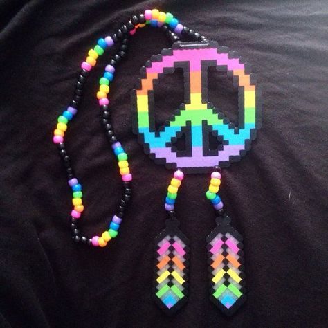 perler bead dream catcher pattern | Rainbow Peace Sign Dream Catcher Kandi Necklace by ... Peace Sign Dream Catcher, Rainbow Peace Sign, Kandi Necklace, Perler Projects, Diy Kandi Bracelets, Rainbow Peace, Kandi Kid, Kandi Ideas, Beads Patterns