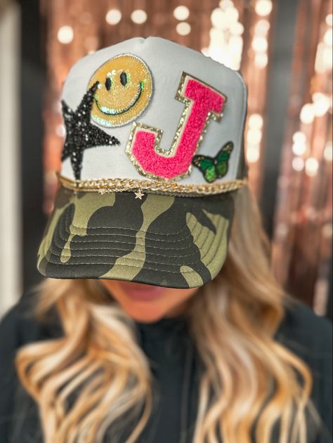 Custom-made, preppy, camo trucker hat made by MUDDY CREEK clothing boutique Sorority Trucker Hat Designs, Hat Patch Bar, Bride Trucker Hat With Patches, Trucker Hat Business, Patch Trucker Hat Diy, Trucker Hat Party Ideas, Trucker Hat Inspiration, Trucker Hat Display Ideas Craft Show, Diy Trucker Hat Patch