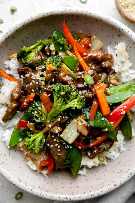 This quick & easy Beef and Vegetable Stir Fry rivals ANY takeout! Tender steak, loads of veggies, & a homemade stir fry sauce made from pantry staples. Serve over rice for a well-balanced weeknight dinner with outrageous flavor. BONUS! Since stir fry is a naturally flexible dish, you can swap ingredients with whatever you love most or happen to have on hand. Simple substitution ideas provided. #stirfryrecipes #stirfrysauce #beefstirfryrecipes #beefrecipes #easydinnerideas #dinnerrecipes Beef And Vegetable Stir Fry, Beef Broccoli Stir Fry, Homemade Stir Fry Sauce, Vegetable Stir Fry Recipe, Homemade Stir Fry, Steak Stir Fry, Beef Stir Fry Recipes, Serve Over Rice, Beef Broccoli