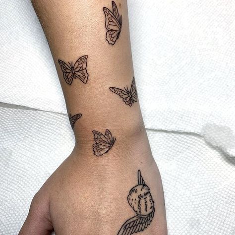 i’m in love with these ones😍 • • #nessabarrett #janesabarrett” • Nov 30, 2020 at 4:20am UT Butterfly Neck Tattoo, Butterfly Tattoos On Arm, Butterfly Hand Tattoo, Small Finger Tattoos, Hand And Finger Tattoos, Elements Tattoo, Small Girl Tattoos, Stomach Tattoos, Wrist Tattoos For Women