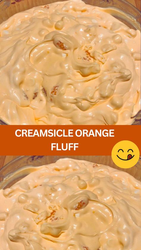 Looking for a sweet and refreshing treat to satisfy your cravings? Look no further than this delightful Creamsicle Orange Fluff recipe! With its cream... Creamsicle Fluff Salad, Orange Sherbert Dessert, Creamsicle Dessert Recipes, Orange Cream Dessert, Keto Orange Creamsicle Fluff, Manderine Orange Deserts, Fluff Recipes Desserts, Mandarin Orange Fluff, Orange Fluff Jello Salad Recipe