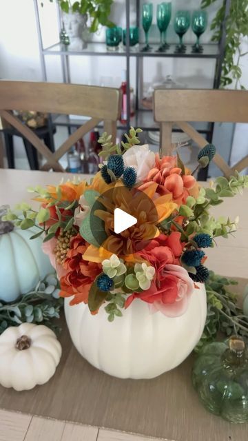 Michelle Beaton on Instagram: "It’s official after Labor Day I am decorating for Fall! This Fall pumpkin centerpiece took me under 10 minutes to make. It  would be perfect for Fall decor for your home or even a wedding or shower centerpiece. A glass jar could be added to the center to swap out faux flowers for real ones.   Do you decorate for Fall or Halloween? Or maybe neither?  #falldecor #diydecor #seasonaldecor #fallstyle  #pumpkincrafts #fallcrafts #diycrafts" Faux Pumpkin Centerpieces, Diy Pumpkin Centerpieces Fall, Pumpkin Decorating Flowers, Diy Fall Table Centerpieces Dollar Store, Pumpkin Decorating With Flowers, Pumpkin Vase Centerpiece, Faux Pumpkin Decorating Ideas, Pumpkin Baby Shower Centerpiece, Diy Fall Centerpieces