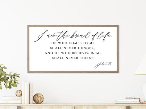 "Save 15% on your next purchase, sign up here: bit.ly/hpmsignup Hand crafted framed Bible Quote Sign. This wooden wall art hanging that reads \"I am the bread of life. He who comes to me shall never hunger, and he who believes in me shall never thirst.\" is the perfect large piece of art for any Christian home. This sign would make a beautiful piece in a dining room or kitchen. Multiple color and size options available in the drop-down ordering menu. Sign sizes may vary by ½ inch. The sign shown Dining Room Wall Quotes, Kitchen Bible Verses, Kitchen Scripture, John 6 35, Wall Art Dining Room, Wall Art Dining, Bread Of Life, Art Dining Room, Random Products