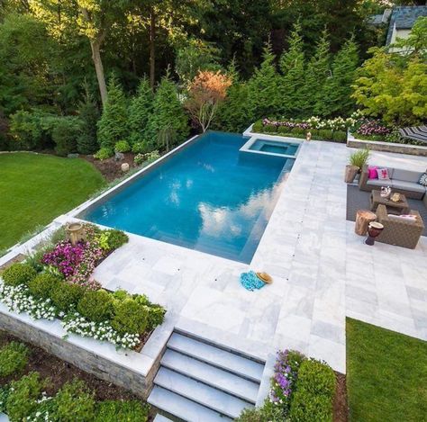 Outdoor Pool On Slope, Pool With Patio Ideas, Elevated Inground Pool, Pool Patio Landscaping Backyard Ideas, Back Garden Pool, Backyard Hardscape Ideas With Pool, Landscape Around A Pool, Raised Pool Landscaping, Pool Terrace Ideas