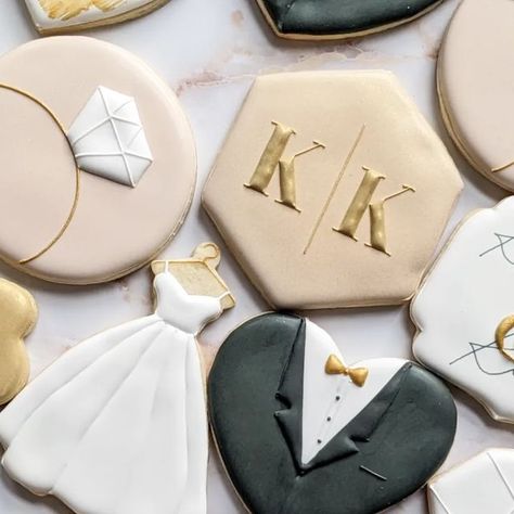 Baked by Mina on Instagram: "Luxury gold and diamond themed wedding cookies 💍💛 . . . #sugarcookies #weddingsugarcookies #weddingdresscookies #dessert #goldcookies #cookier #monogramcookies #engagementcookies #cookiesofinstagram #decoratedcookies #cookies #themedparty #royalicing #royalicingcookies #dessertsofinstagram #tuxedocookies #weddingcookies #cookieart #cookieartist #rhodeisland #providence #bakersofinstagram #art #beautiful #diamondcookies" Black Wedding Cookies, Diamond Themed Wedding, Diamond Wedding Theme, Wedding Dress Cookies, Gold Cookies, Engagement Cookies, Monogram Cookies, Bridal Shower Cookies, Instagram Luxury