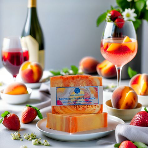 Brighten up your skin with a refreshing Strawberry Peach Champagne Bar Soap! 🥂 🍓 This soft, sparkly soap is made to replenish & reveal your mesmerizing glow from the first lather. 🍑 Smells Like: Being served a fizzy-fresh glass of strawberry champagne with a juicy, ripe peach cocktail 🍑 Notes of: Sweet Peach, Soft Coconut, Strawberry, Ripe Raspberry Add some sweet sparkle to your skincare routine with our Strawberry Peach Champagne Soap! ✨ Shop now: Link in bio 🔗 | @bouldercitysoap . .... Champagne Soap, Peach Cocktail, Strawberry Champagne, Champagne Bar, Soap Shop, Sweet Peach, Bar Soap, Skincare Routine, Raspberry