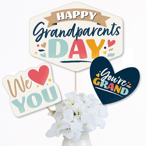 Happy Grandparents Day Centerpiece Sticks INCLUDES 15 Grandparents table toppers in three different shapes, 15 sticks and stickers for easy assembly. Grandparents party table decorations are perfect for a grandma and grandpa event. Happy Grandparents Day Party Centerpiece Sticks SIZE five Happy Grandparents Day table toppers, 11" wide x 8.25"; five We Love You table toppers, 6" wide x 5" tall; and five You're Grand table toppers, 6" wide x 5.5" tall. The unique design and variety of pieces makes Grandparents Day Centerpiece, Holiday Party Centerpieces, Happy Grandparents Day, Party Tables, Party Centerpiece, Centerpiece Table, Parents Day, Party Table Decorations, Booth Props