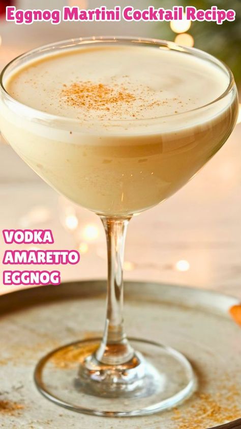 Eggnog Martini Cocktail Recipe: Your Festive Holiday Delight - Thirsty Tales Eggnog Martini Recipe Vanilla Vodka, Egg Nog Martini Recipe, Creamy Martini Recipes, Creamy Christmas Cocktails, Holiday Martinis Christmas, Egg Nog Martini, Holiday Rum Drinks, Holiday Martini Recipes, Eggnog Martini Recipe