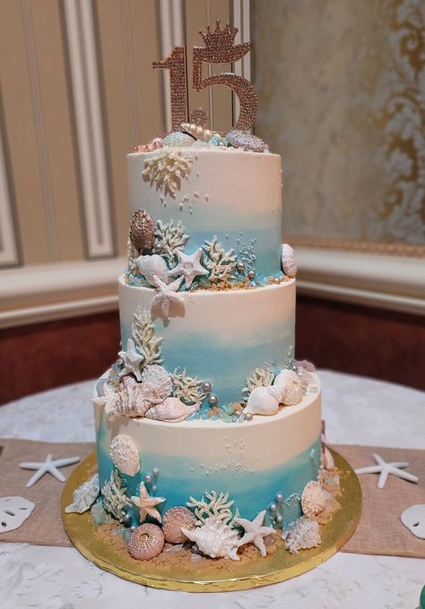 Ocean Wedding Cake Ideas, Sea Theme Quinceanera Ideas, Sea Themed Quinceanera, Wedding Cake Sea Theme, Coastal Wedding Cake Ideas, Costal Theme Birthday Party, Under The Sea Sweet 16 Cake, Quinceanera Beach Theme, Ariel Theme Quinceanera