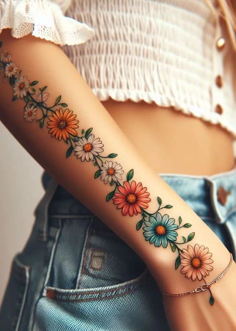 Flower Tattoos For Women Thigh, Daisy Tattoo On Leg, Chain Of Flowers Tattoo, African Daisy Tattoo, Colorful Daisy Tattoo, Crazy Daisy Tattoo, Daisy Vine Tattoo, Daisy Tattoos For Women, Flower Chain Tattoo