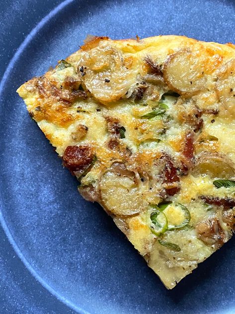 a wedge shaped slice of potato frittata, on a blue plate Potato Frittata Recipes, Bacon Frittata, Recipe With Bacon, Potato Frittata, Food Fest, Frittata Recipe, Bacon Potato, Bacon And Cheese, Skillet Potatoes