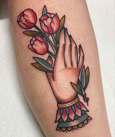 Tradition Hand Tattoo, Trad Tattoo Hand, American Traditional Tulip, American Traditional Quote Tattoo, American Traditional Tulip Tattoo, American Trad Hand Tattoo, Tulip Tattoo Traditional, Pinwheel Flower Tattoo, Traditional Tattoo Hand Holding