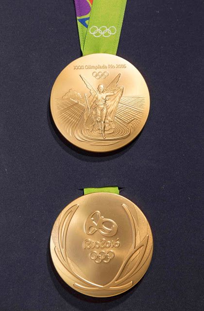 The reverse (top) and obverse of Rio 2016 Olympics gold medal. Photo credit: Rio 2016/Alex Ferro. Badminton Tips, Gymnastics Medals, Football Medals, Medal Design, Olympics Activities, Olympic Logo, Gold Inspiration, Summer Olympic Games, Champions Trophy