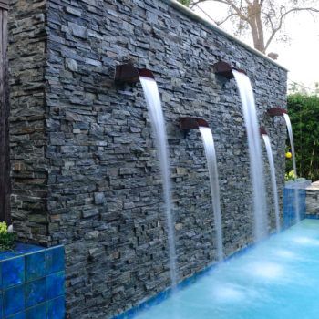 Custom Pool Water Features | Waterfalls, Gushers, Jets | Platinum Pools Wall Waterfall, Swimming Pool Waterfall, Outdoor Wall Fountains, Water Fountain Design, Water Feature Wall, Pool Wall, Swimming Pool Architecture, Outdoor Water Features, Pool Water Features