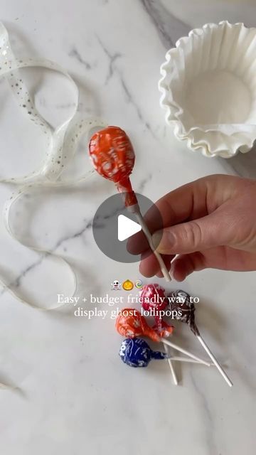 Noocx® - Smart Gadgets on Instagram: "Here’s a fun way to display these cute coffee filter ghost lollipops! 👻🎃 Great content by @kelly.oester for more amazing content like this!

Comment “links” and I’ll send you links to the ribbon, jack o lantern, and styrofoam I used!

#lollipop #partyfavors #treats #easytreats #budgetfriendly" Coffee Filter Ghost Lollipops, Ghost Suckers Halloween, Ghost Lollipops Halloween, Sucker Ghosts, Lollipop Ghost, Ghost Suckers, Ghost Lollipops, Lollipop Display, Simple Budget