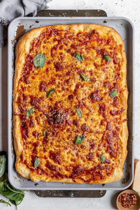 This Sheet Pan Pizza is perfect for a family night pizza night or even serving a crowd. The homemade, thick, crisp, and chewy crust takes this recipe to the next level and you can add all of your favorite toppings. Baked right on your sheet pan with no fuss of using pizza ovens or baking steels. Get ready to fall in love with this scratch-made pizza! #sheetpanpizza #homemadepizza #sheetpanrecipes #easypizza #homemadepizzadough #pizzadough #cheesepizza #pizzanight Gluten Free Sheet Pan Pizza, Homemade Pizza Sheetpan, Sheet Pan Pizza Recipes, Pan Pizza Crust Recipe, Sheet Pan Pizza, Oven Baked Pizza, Pasta Restaurants, Pizza Ideas, Grain Recipes