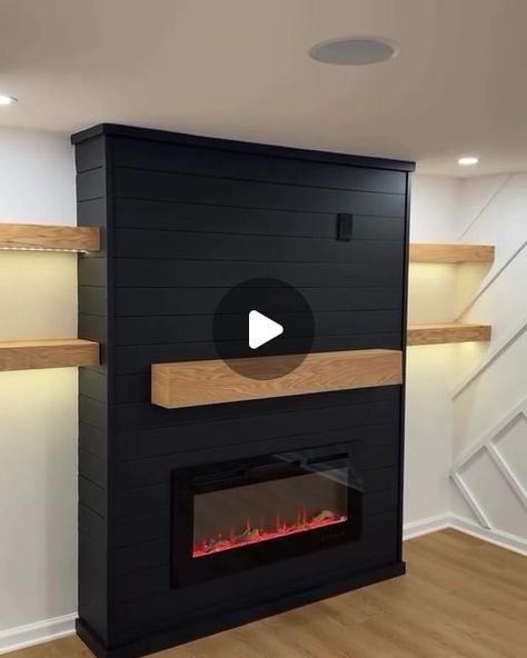 INTERIOR DESIGN & DECOR on Instagram: "Thought about this Custom Electric fireplace with a hidden drawer and floating shelves!? • • • #floatingshelves  #diyfireplace #electricfireplace #carpentry #carpenter  #woodworking #shiplap #finewoodworking  #featurewall #beforeandafter #handmade #floatingshelves #shelves" Diy Fireplace With Shelves On Side, Shiplap Fireplace With Floating Shelves, Floating Fireplace Ideas, 2024 Thought, Wooden Accent Wall, Floating Fireplace, Hidden Drawer, Fireplace Shelves, Game Room Basement