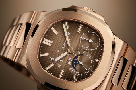 Patek Philippe Releases Nautilus 5712/1R Moon Phases in Rose Gold with Sunburst Brown Dial | WatchTime - USA's No.1 Watch Magazine Rose Gold Brown, Patek Philippe Watches, Gold Watches Women, Watches Women, Patek Philippe Nautilus, Gold Collection, Luxury Watches For Men, Patek Philippe, Nautilus