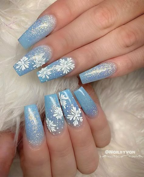 2. Frosty blue Christmas Nails When it comes to winter nails, frosty blue must try for winter nails. The nails features ombre blue with... Blue Christmas Nails, Nail Art Noel, Winter Nails Acrylic, Christmas Gel Nails, Snowflake Nails, Christmas Nails Acrylic, Colorful Nail Designs, Nail Designs Glitter, Festival Nails