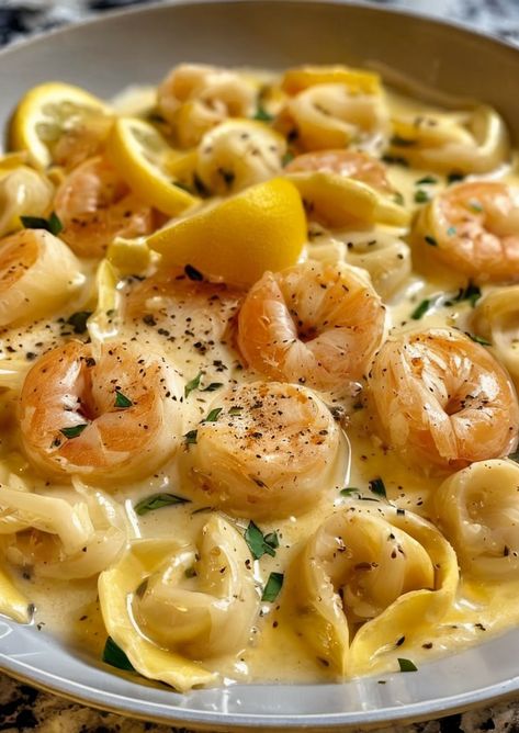 Indulge in creamy Shrimp Tortellini with a zesty Lemon Garlic Sauce. Quick, flavorful, and perfect for a gourmet weeknight dinner! #PastaLovers #SeafoodRecipe #QuickMeals #GourmetDinner #EasyRecipes Tortellini Butter Sauce, Shrimp Tortellini With Garlic Sauce, Tortellini And Shrimp Recipes, Shrimp Gnocchi Recipes, Prawn Tortellini, Shrimp And Tortellini Recipes, Shrimp Tortellini Recipes, Tortellini Sauce, Shrimp Pasta Recipes Creamy