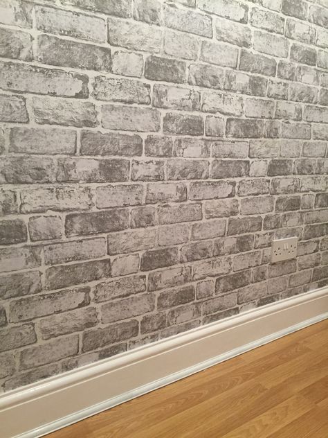 Grey brick wallpaper, Homebase £10.95 per roll Grey Brick Wallpaper Bedroom, Grey Brick Accent Wall, Brick Effect Wallpaper Bedroom, Grey Wash Brick, White Brick Accent Wall, Brick Wallpaper Kitchen, Grey Brick Wallpaper, Brick Wallpaper Living Room, Wallpaper Lounge