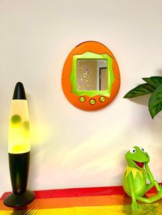 Tamagotchi Wall Mirror Orange & Green Mini 3D Printed Hanging Home Decor 90s Nostalgia Vpet Digimon Funky - Etsy Cool Items To Buy, Maximalist Room Aesthetic, Weird Furniture, Funky Decor, Hanging Home Decor, Quirky Home Decor, Apartment Decor Inspiration, 90s Nostalgia, Cute Room Decor