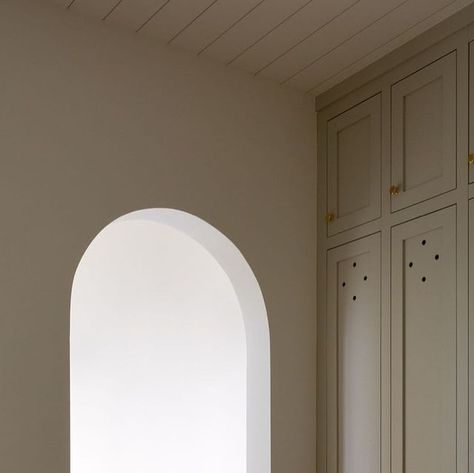 Light and Dwell on Instagram: "The cutout detail on the mudroom cabinets adds a European detail that otherwise would be boring floor to ceiling cabinets.  This space doesn’t need much, because the hard finishes really speak for themselves. #lessismore #utaheuropeanmodernproject 

Photographer: @amybartlam" To Ceiling Cabinets, Ceiling Cabinets, Arched Entry, Terracotta Flooring, Floor To Ceiling Cabinets, Mudroom Cabinets, Light And Dwell, Green Cabinets, Brick Flooring