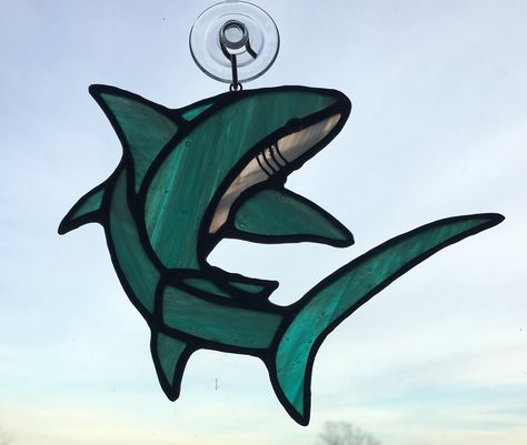 Shark 8 stained glass sun catcher. $45. AVAILABLE Blue Stained Glass Art, Shark Stained Glass Patterns, Stained Glass Fish, Stained Glass Shark, Whale Stained Glass Pattern, Shark Stained Glass Art, Under The Sea Stained Glass Craft, Underwater Stained Glass Pattern, Stained Glass Orca